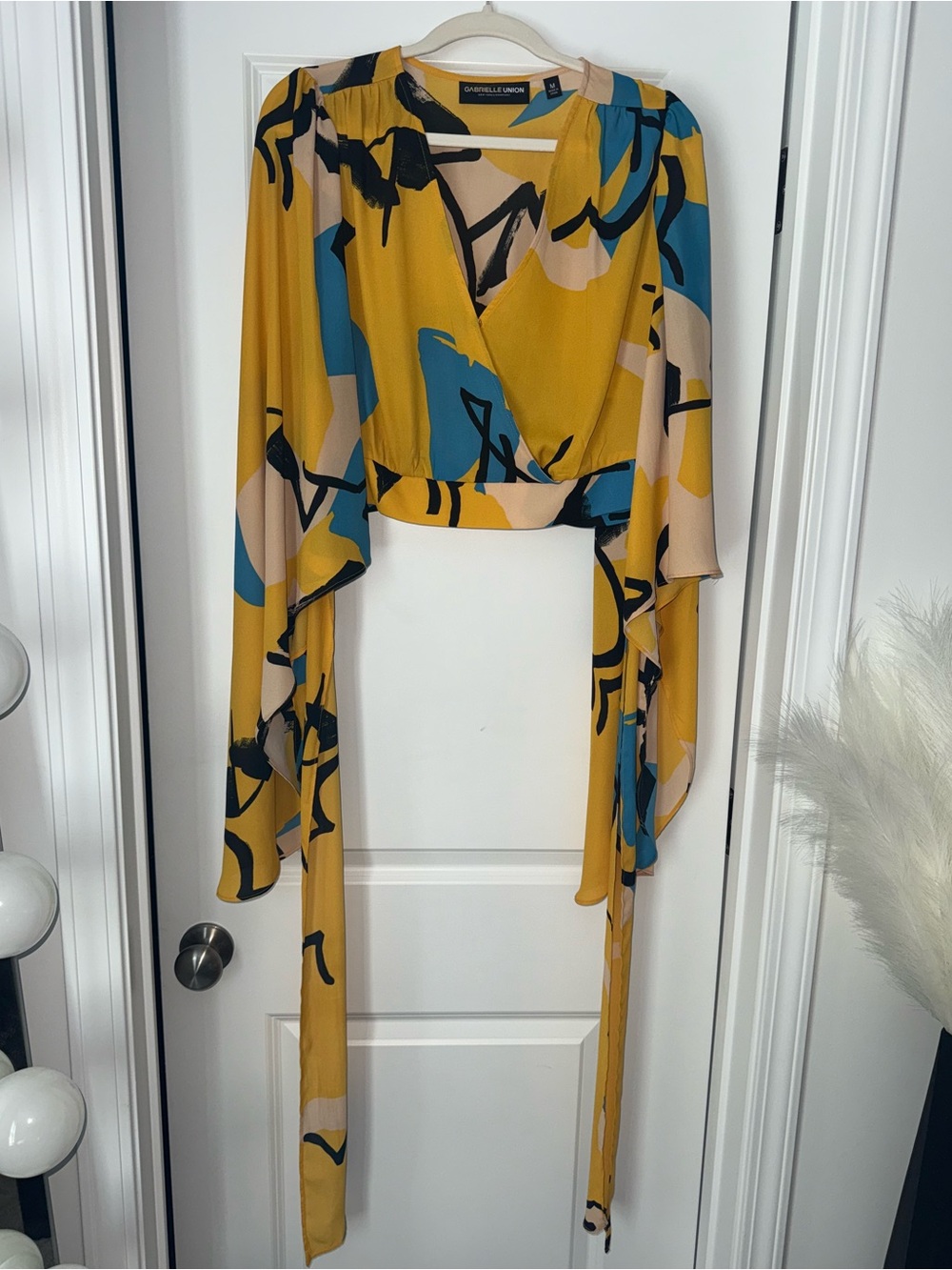 Gabrielle Union Mustard Abstract Print Wrap Blouse